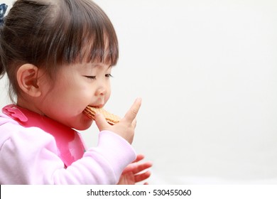 Japanese Girl Eating Wafers (2 Years Old)
