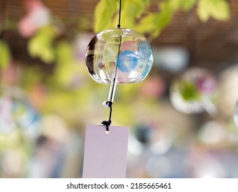 Japanese Glass Wind Chime Swaying In The Wind