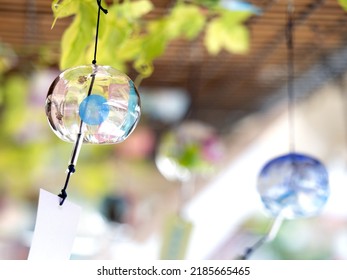 Japanese Glass Wind Chime Swaying In The Wind