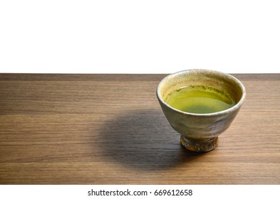 Japanese Green Tea In Traditional Ceramic Cup On Wooden Tray With Copy Space And Clipping Path