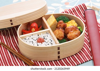 japanese homemade packed lunch in wooden bento box