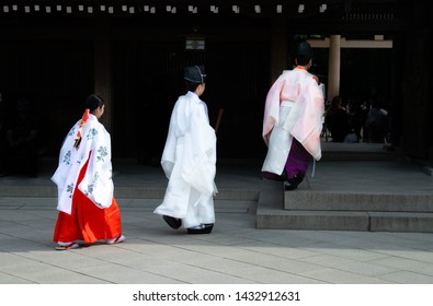 Japanese Kannushi In Midst Of A Wedding