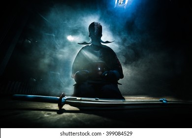 Japanese Kendo Fighter Is Preparing To Fight.  (Inscription On The Japanese 