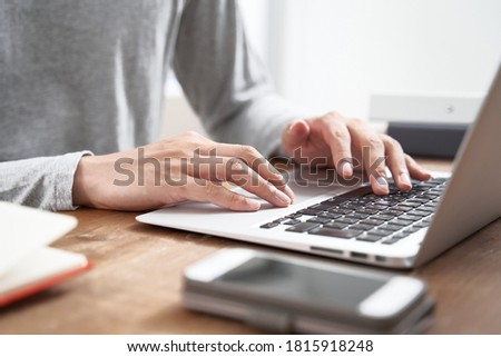 Japanese male businessman working from home in plain clothes