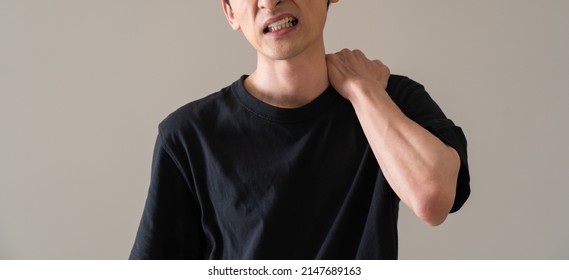 Japanese Man Complaining Of Neck Pain