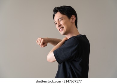 Japanese Man Complaining Of Neck Pain