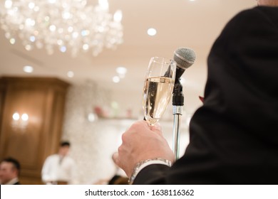 Japanese man giving a speech at a party