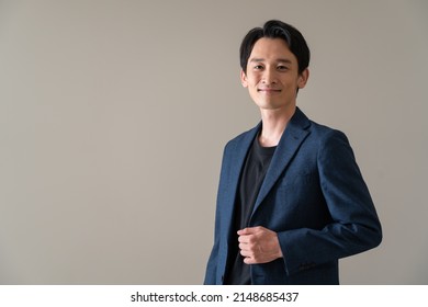 Japanese man in a jacket - Shutterstock ID 2148685437