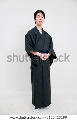 Japanese man in kimono and white background