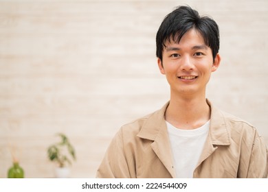 Japanese man looking at camera - Shutterstock ID 2224544009
