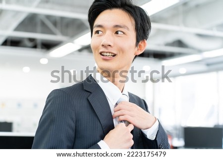 Japanese man in a young suit