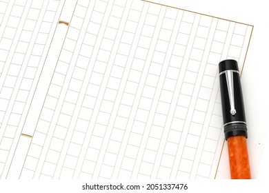 Japanese manuscript paper with fountain pen, Genko yoshi on wooden table  - Powered by Shutterstock