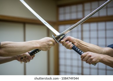 Japanese Martial Arts Athlete Training Kendo In A Dojo - Samaurai Practicing In A Gym