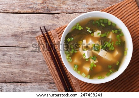 Japanese miso soup in a white bowl on the table. horizontal view from above  ストックフォト © 