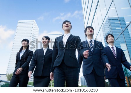 Japanese new society who stand in the office