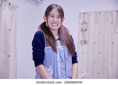 Japanese Nursery Teacher, Caregiver Smiling