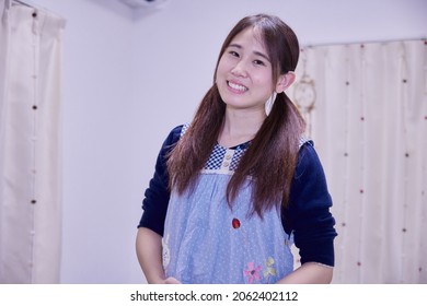 Japanese Nursery Teacher, Caregiver Smiling