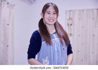 Japanese Nursery Teacher, Caregiver Smiling