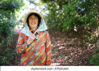 Japanese old person doing agricultural work in rural area