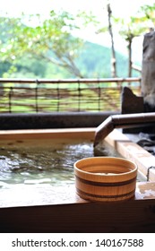 Japanese open air hot spa onsen - Shutterstock ID 140167588