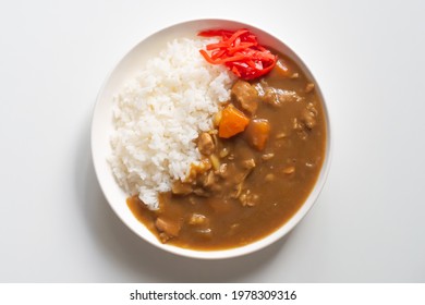 Japanese ordinary curry rice in white dish on white wooden background - Shutterstock ID 1978309316