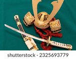 Japanese ornamental helmet and sword of Samurai doll