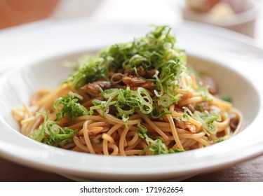 Japanese Pasta With Soy Sauce Mussels, Topped With Diced Scallions