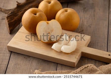 Japanese pears,Asian pears.
Asian pears: any of a variety of pears, mainly of Japanese and Chinese origin, with crisp, juicy flesh and typically have yellow, brown, or green skin.
