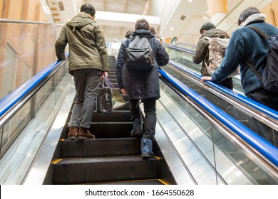 Japanese People Use Escalators In The Subway Station The Left Side Is For People Who Stand But The Right Side Is For People Who Walk On Escalator. Tokyo, Japan February 8,2020