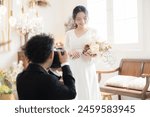 Japanese photographer taking maternity wedding photos. Bridal and wedding commemorative photography.