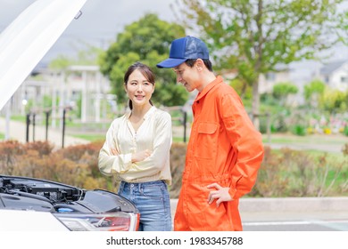 Japanese Portrait Checking A Car