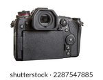 Japanese professional mirrorless digital camera in Micro Four Thirds format. Back view. Isolated on white background