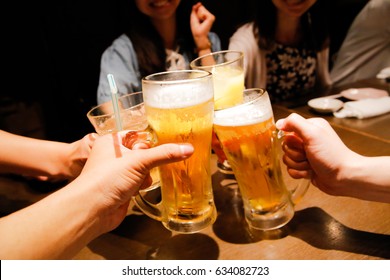 Japanese pub beer cheers - Powered by Shutterstock