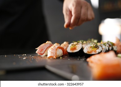 Japanese restaurant, sushi. Classic Japanese sushi served on a stone plate 