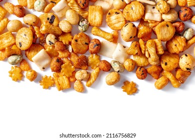 Japanese Rice Crackers, Scattered On A White Background, Overhead Flat Lay Shot With A Place For Text