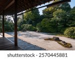 Japanese rock garden or dry landscape view from temple wooden balcony in zen Buddhism Temple of Kenninji, Kyoto, Japan.