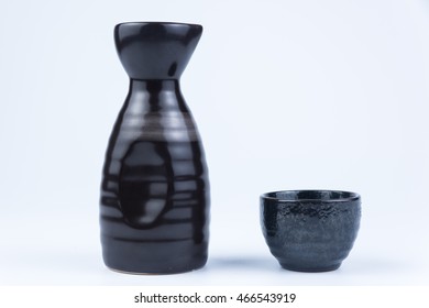 Japanese sake bottle and cup - Shutterstock ID 466543919