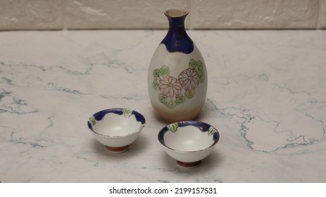 Japanese Sake Set From A Bottle And Two Shot Glasses