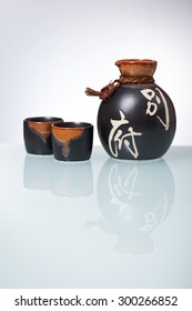 Japanese Sake set from a bottle and two shot glasses