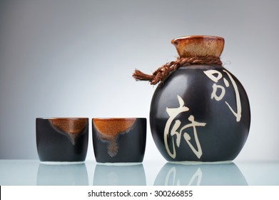 Japanese Sake Set From A Bottle And Two Shot Glasses