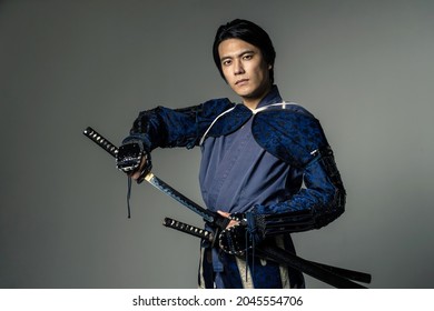 Japanese samurai wielding a sword. Japanese traditional warrior.