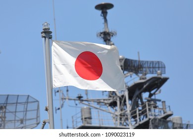 Japanese Self Defence Force Navy War Ship And Japanese National Flag