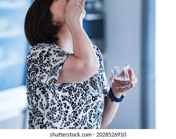 Japanese Senior Woman Taking Medicine