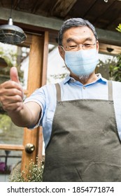 Japanese Shop Owner In Face Mask New Normal Post Covid 19