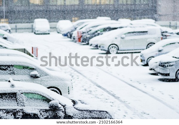 Japanese snowy parking area\
and car
