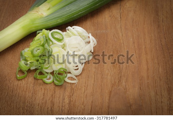 Japanese Spring Onions On Wooden Background Stock Photo Edit Now