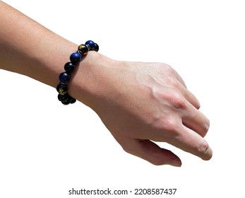 Japanese Stone Bracelet Made Of Blue And Black Stones On Asian Men's Wrists. That Is Believed To Be A Stone That Brings Good Luck Can Attract Positive Energy And Used To Heal The Body And Mind As Well