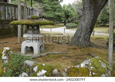 Japanese (stone) lanterns, toro, at various locations (either temples or gardens)