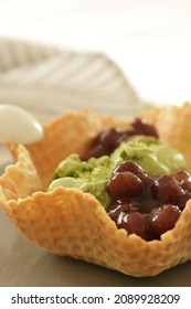 Japanese Style Dessert, Green Ice Cream And Red Bean Served In Waffle Cone Bowl