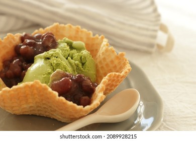 Japanese Style Dessert, Green Ice Cream And Red Bean Served In Waffle Cone Bowl